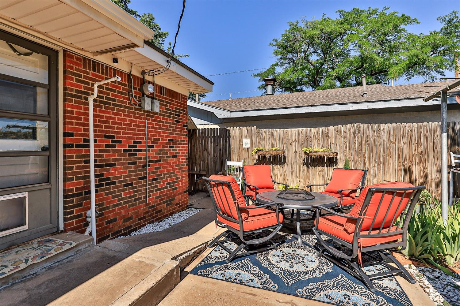 2820 62nd Street Lubbock, TX 79413 - Photo 38 of 43 a backyard of a house with outdoor seating