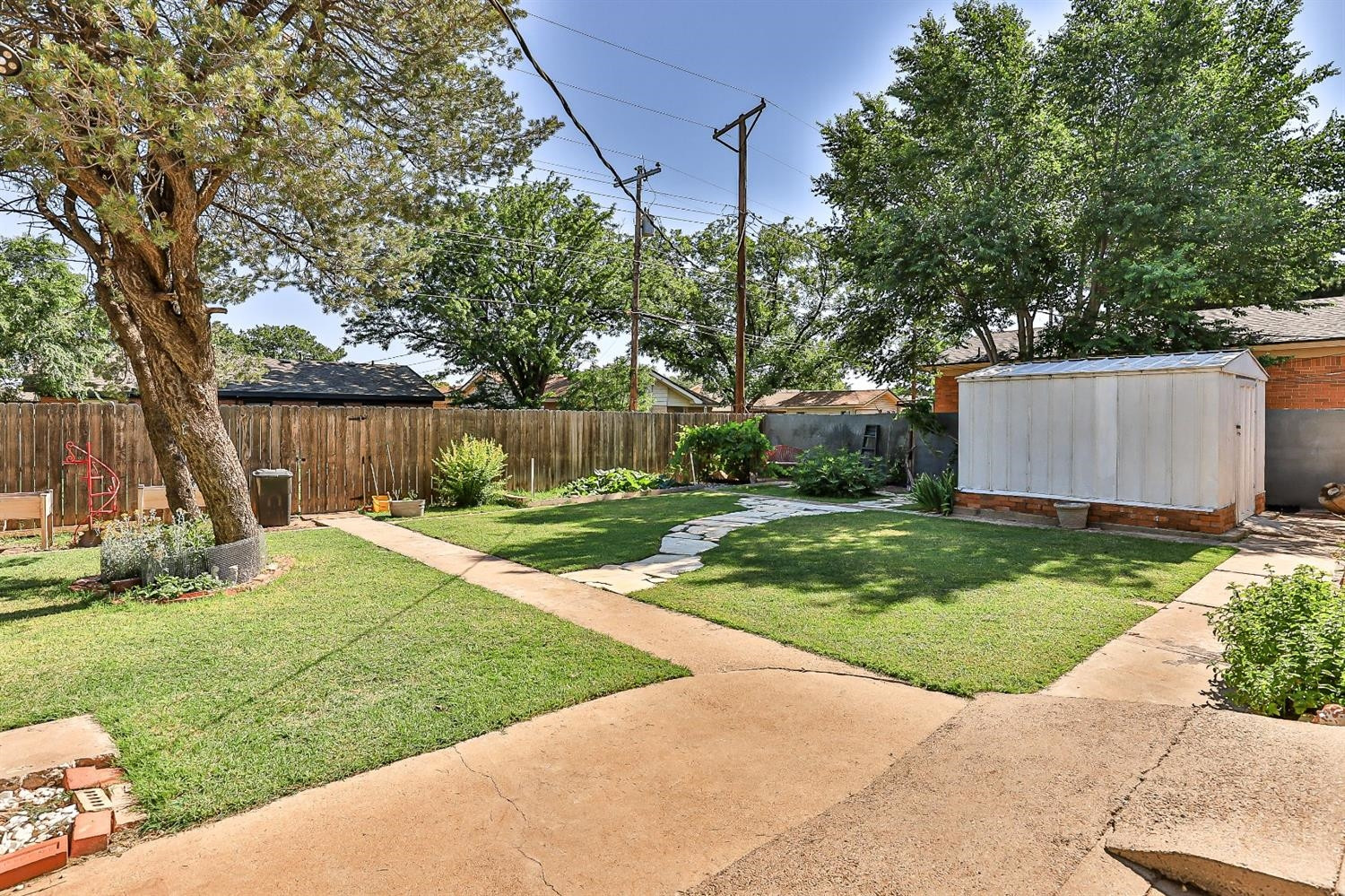 2820 62nd Street Lubbock, TX 79413 - Photo 40 of 43 a view of backyard with green space