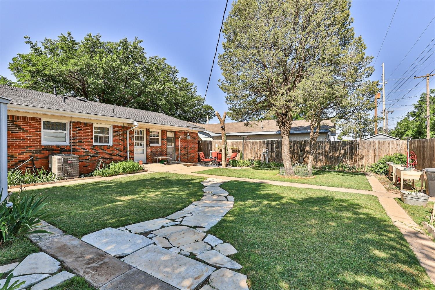 2820 62nd Street Lubbock, TX 79413 - Photo 43 of 43 front view of a house with a yard