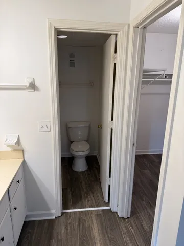 a view of a bathroom from a hallway