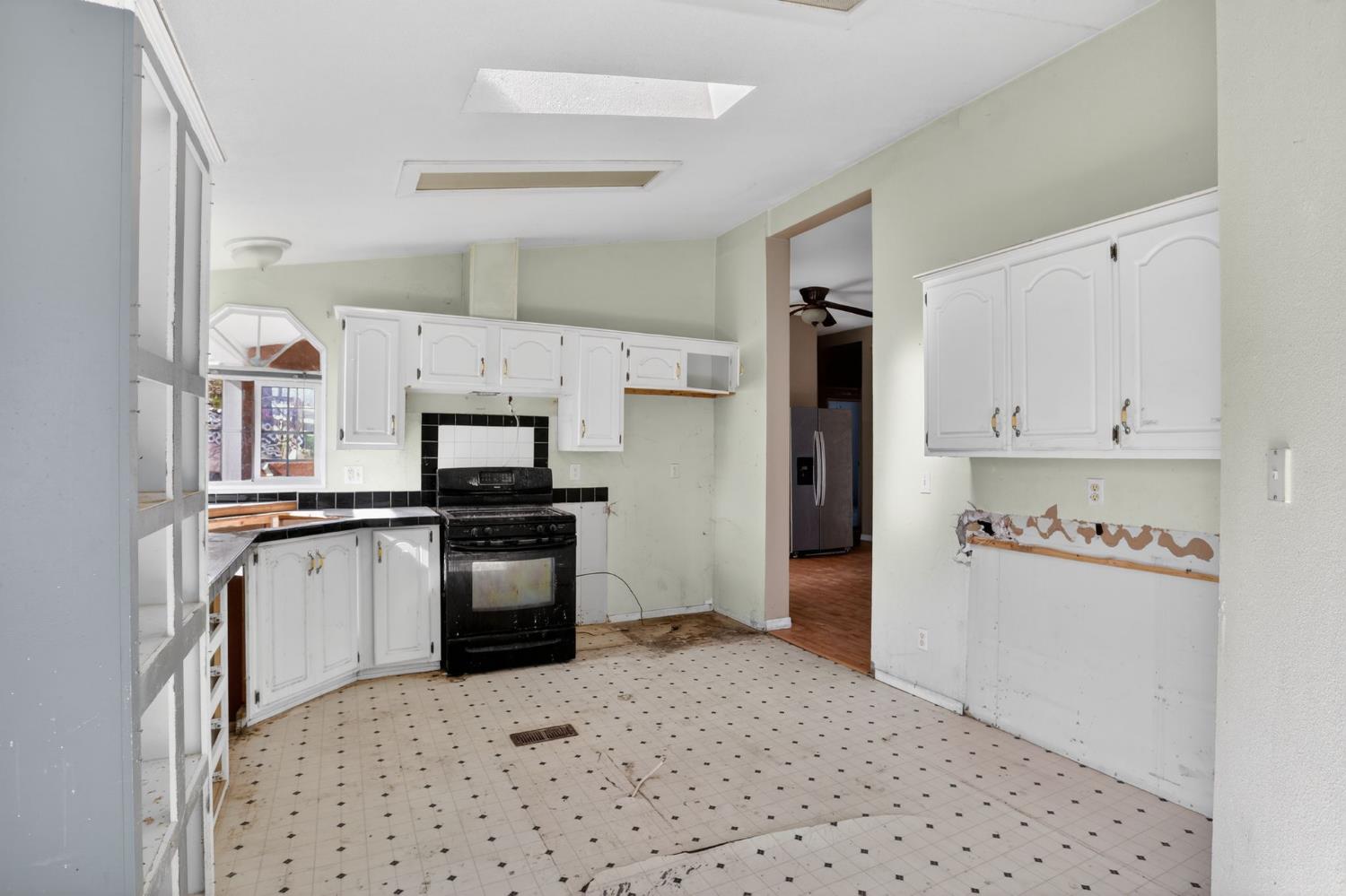 7212 Fox Corning, CA 96021 - Photo 14 of 36 a kitchen with granite countertop cabinets and steel stainless steel appliances