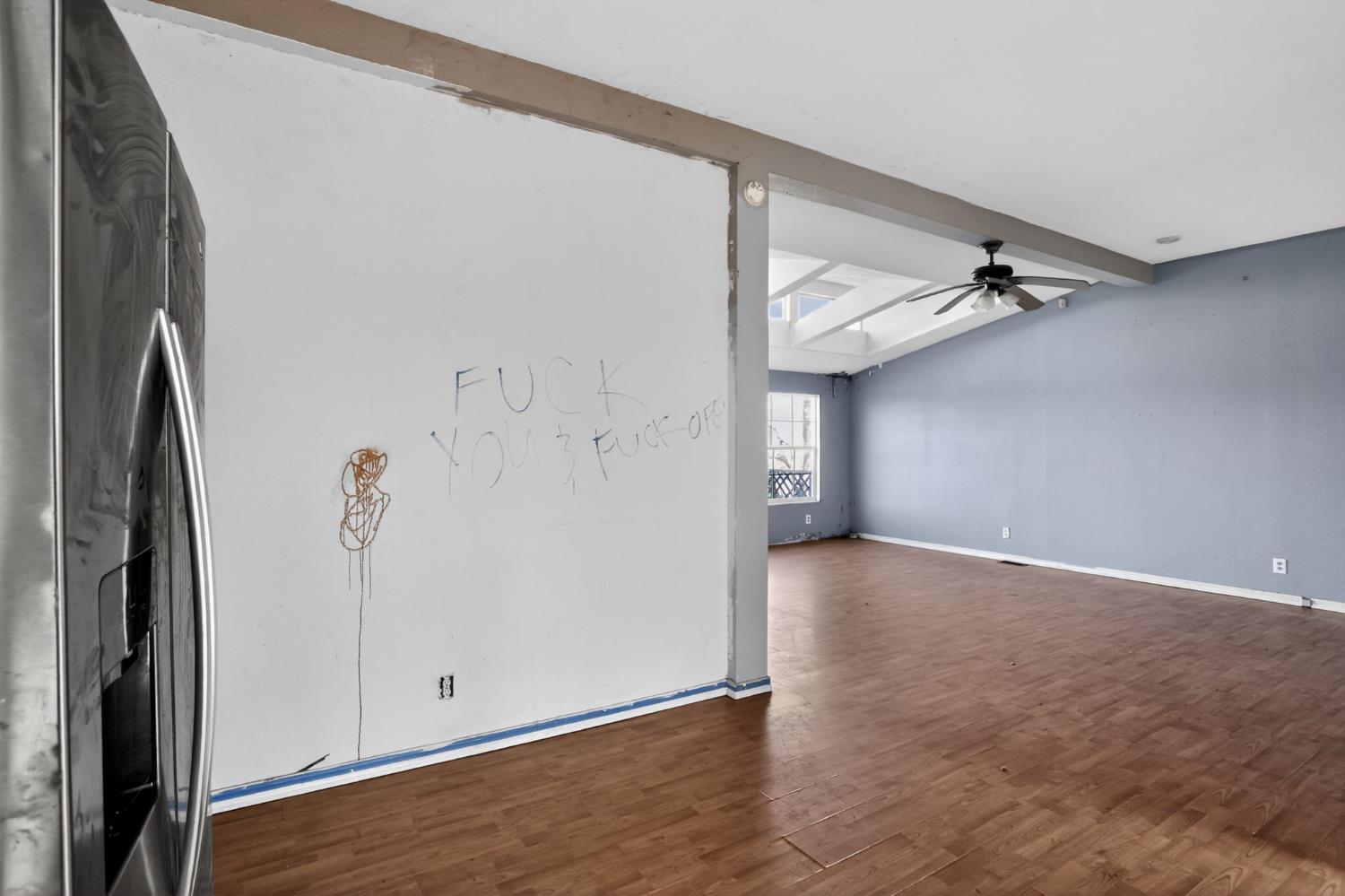 7212 Fox Corning, CA 96021 - Photo 16 of 36 a view of a room with wooden floor and a ceiling fan