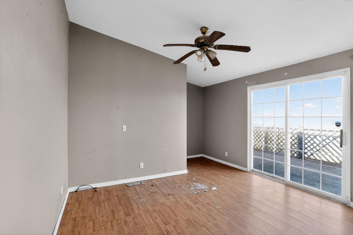 7212 Fox Corning, CA 96021 - Photo 19 of 36 a view of room with wooden floor and windows