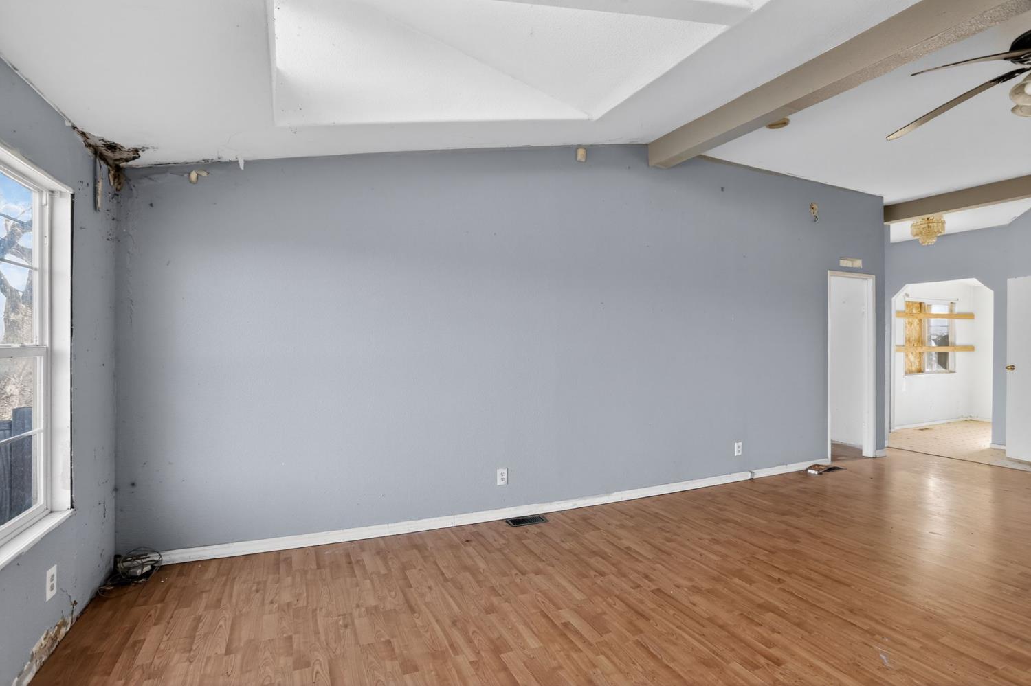 7212 Fox Corning, CA 96021 - Photo 20 of 36 an empty room with wooden floor and windows