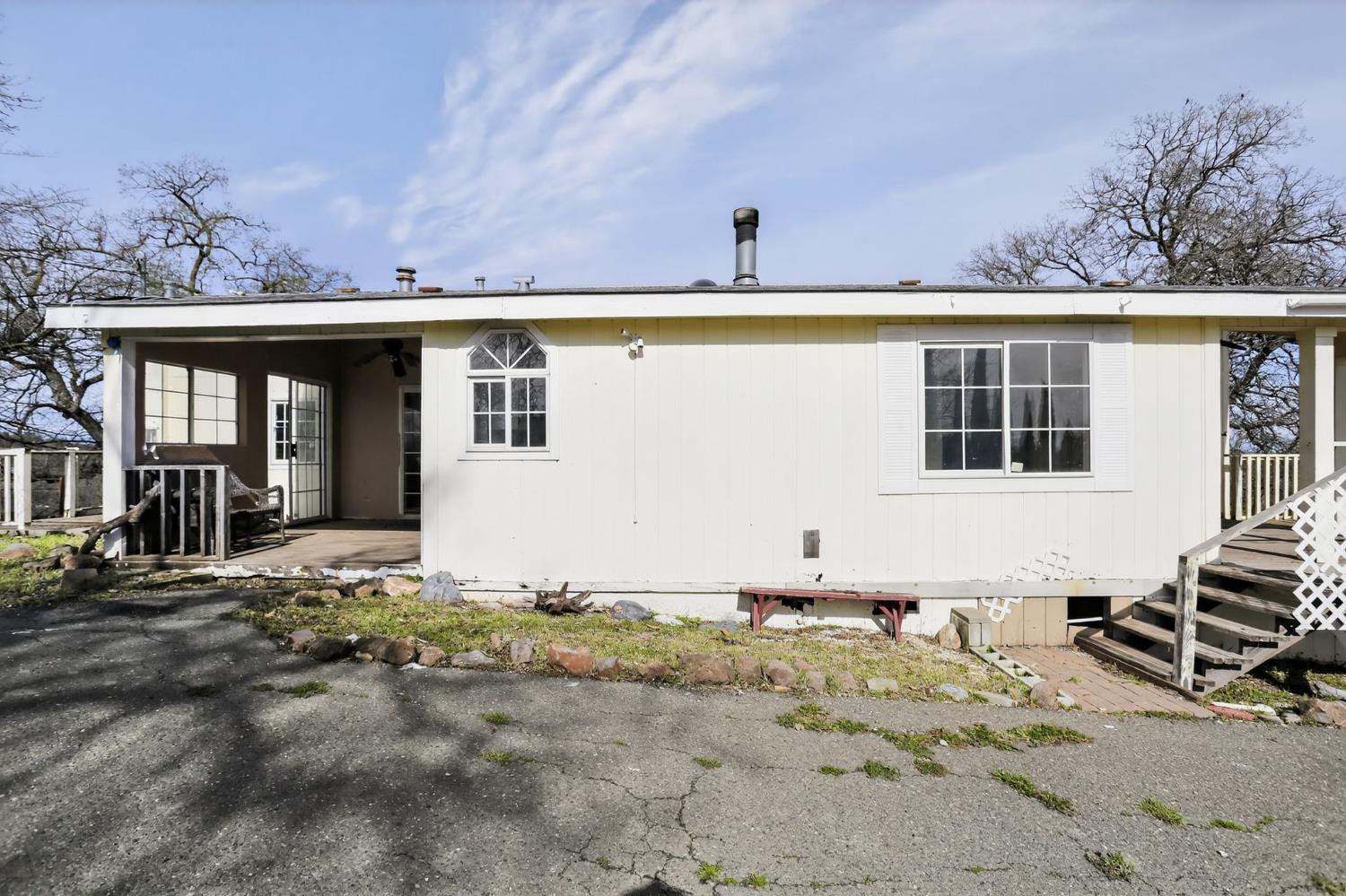 7212 Fox Corning, CA 96021 - Photo 2 of 36 a front view of a house with a yard