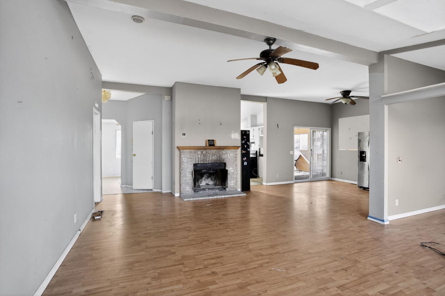 7212 Fox Corning, CA 96021 - Photo 22 of 36 a view of an empty room with window and fireplace