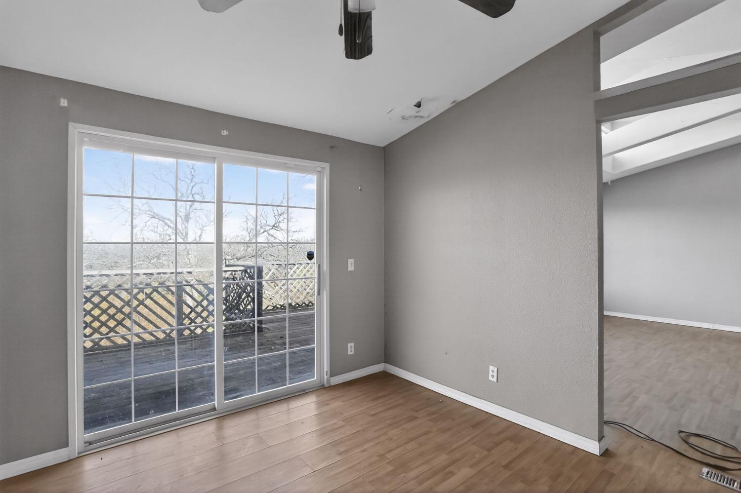 7212 Fox Corning, CA 96021 - Photo 23 of 36 an empty room with wooden floor and windows