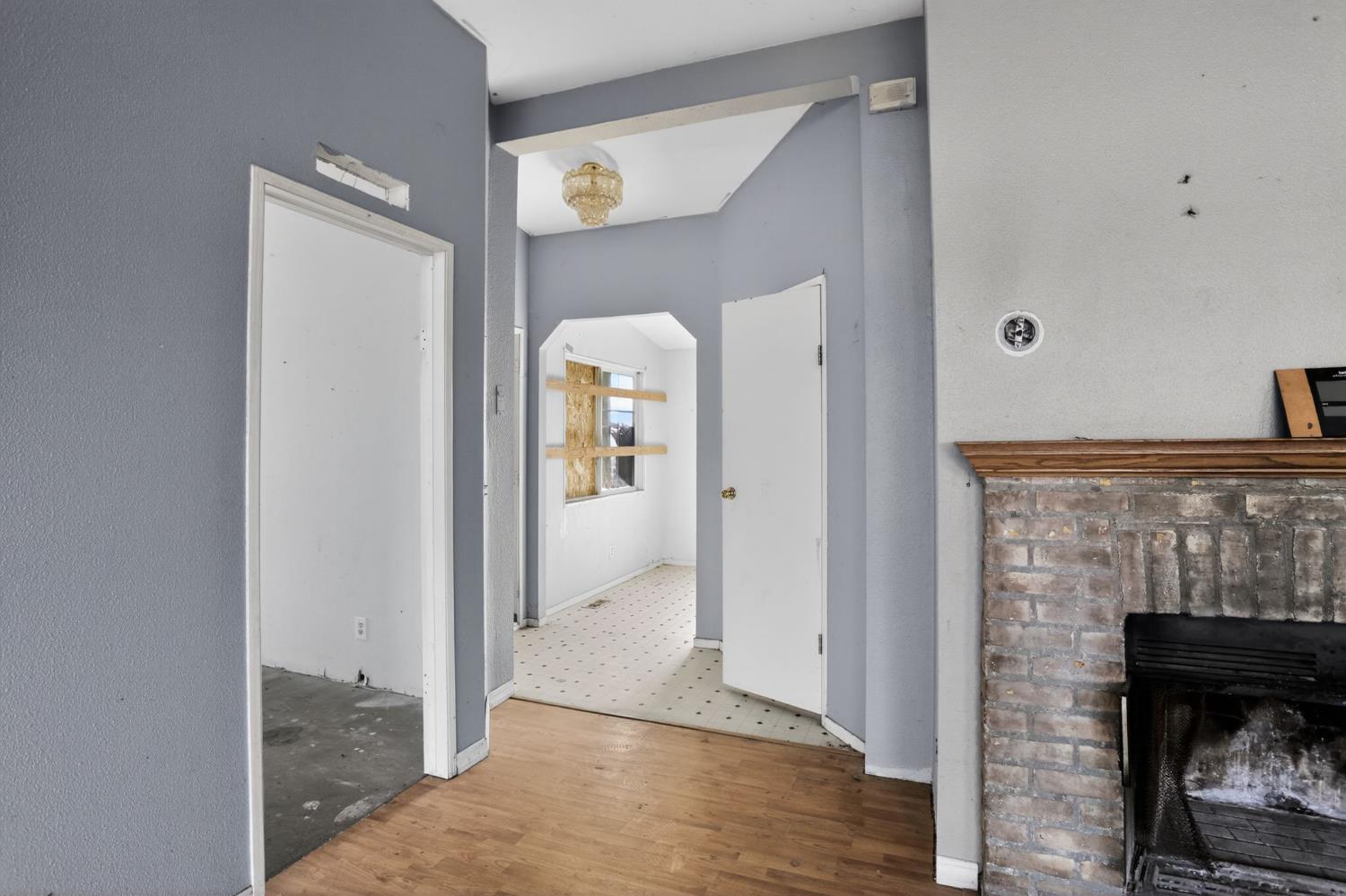 7212 Fox Corning, CA 96021 - Photo 25 of 36 a view of a livingroom with wooden floor and a fireplace