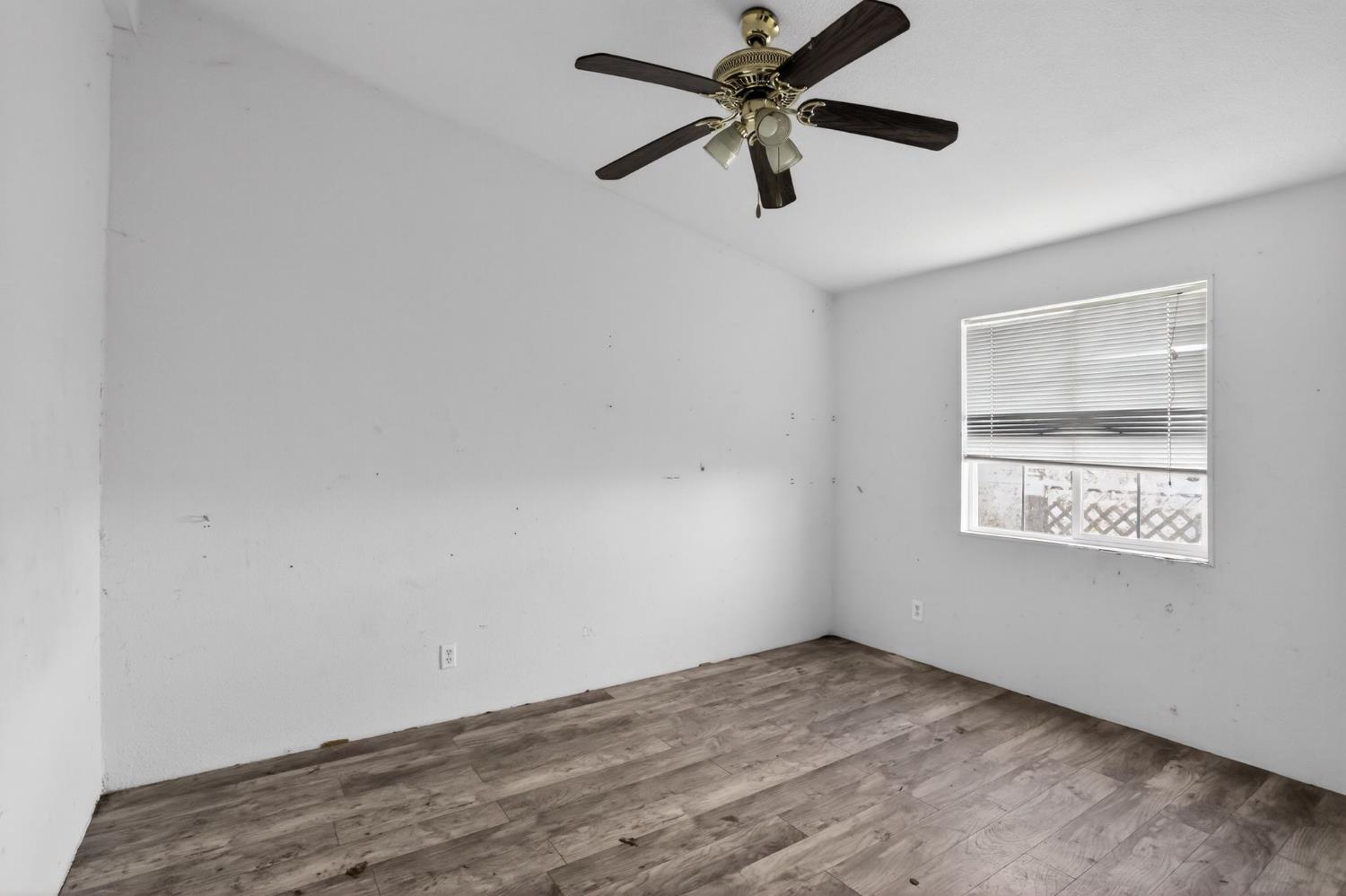7212 Fox Corning, CA 96021 - Photo 30 of 36 an empty room with a window and a fan