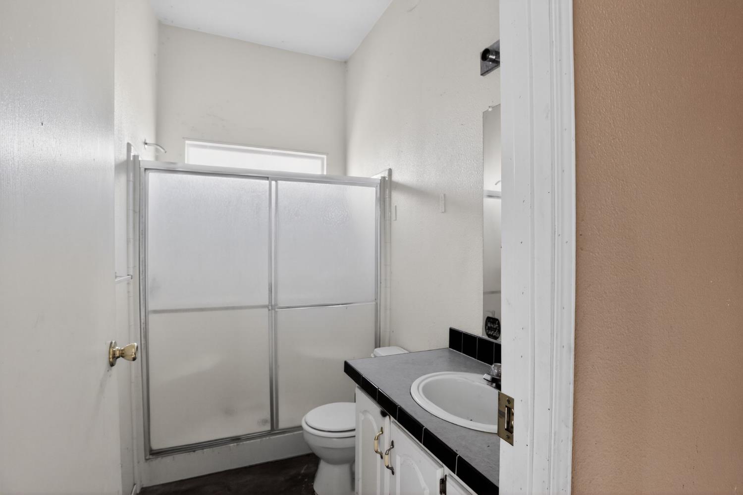 7212 Fox Corning, CA 96021 - Photo 32 of 36 a bathroom with a sink toilet and shower