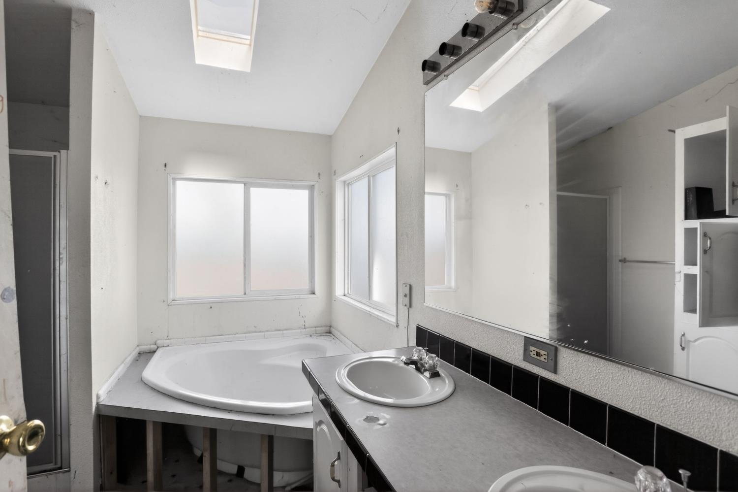 7212 Fox Corning, CA 96021 - Photo 33 of 36 a bathroom with a sink and a mirror