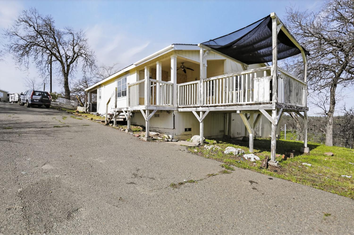 7212 Fox Corning, CA 96021 - Photo 6 of 36 a view of a house with wooden fence