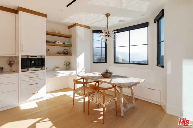 a view of a kitchen area with furniture and window