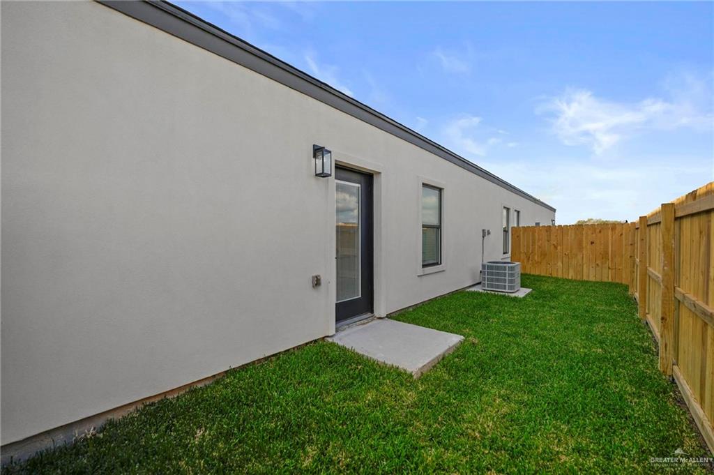 2709 Mockingbird Road, Unit 4 Weslaco, TX 78596 - Photo 19 of 20 a view of backyard with hardwood