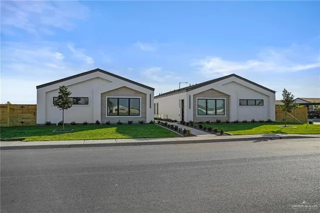 a view of house with outdoor space and street view