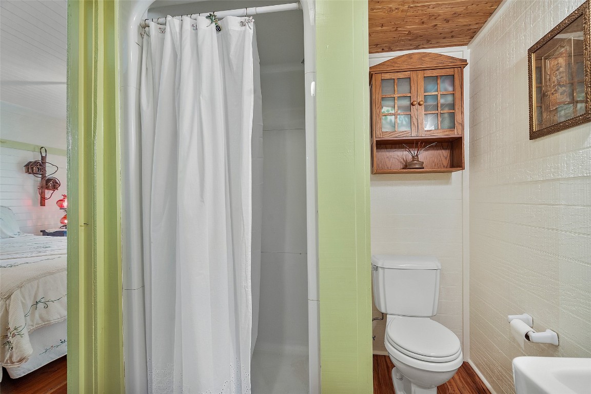 65094 Logan Road Yulee, FL 32097 - Photo 16 of 38 a white toilet sitting next to a bathroom