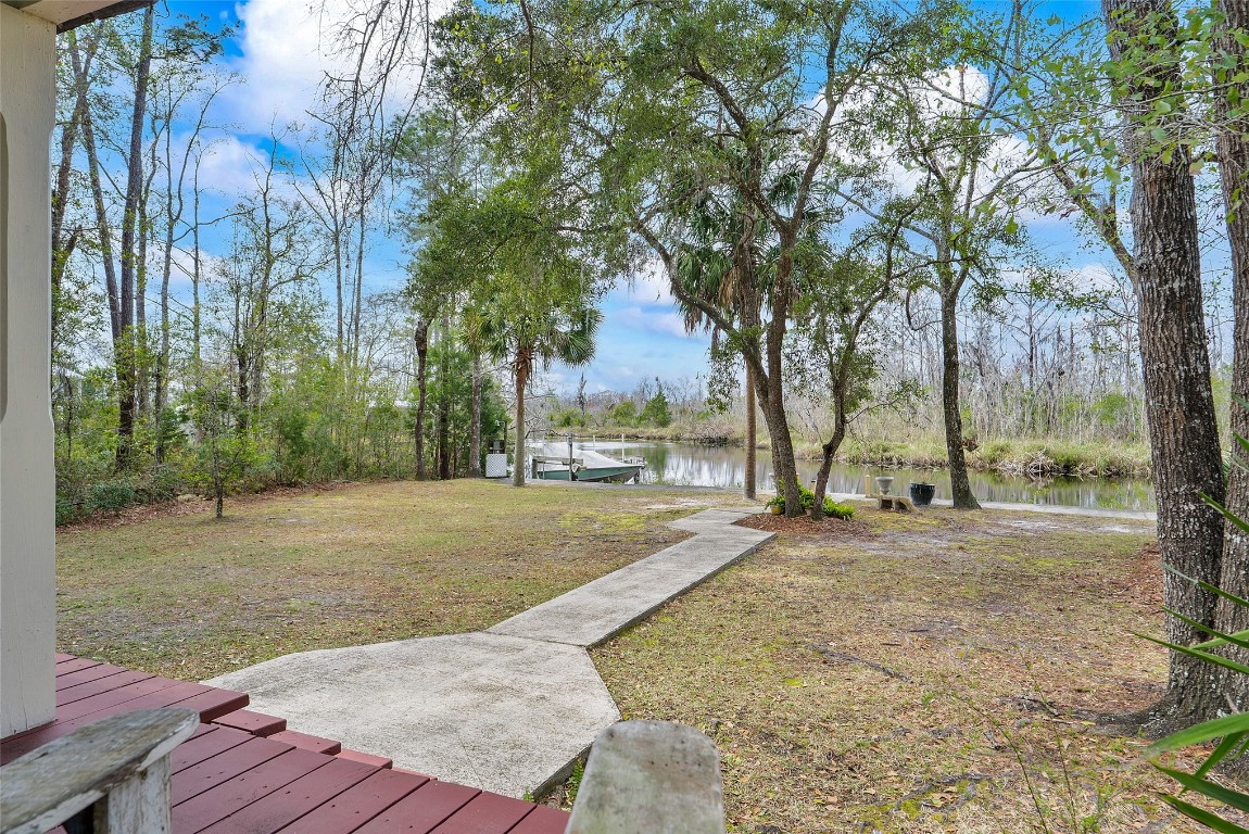 65094 Logan Road Yulee, FL 32097 - Photo 27 of 38 a view of a yard with trees