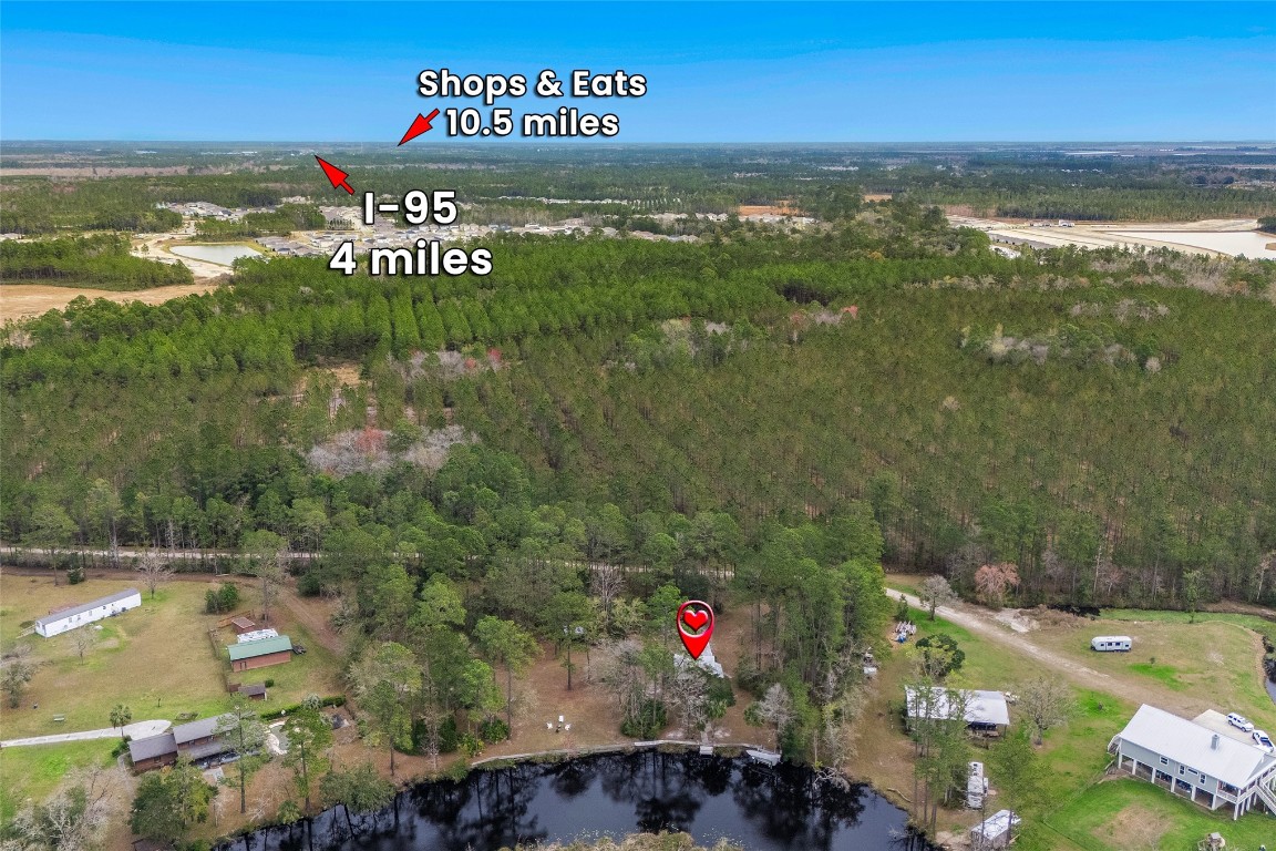 65094 Logan Road Yulee, FL 32097 - Photo 33 of 38 a view of a street with an ocean view