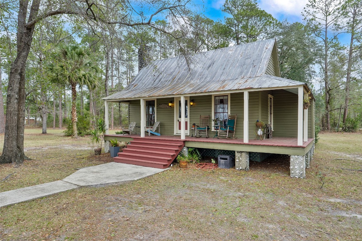 65094 Logan Road Yulee, FL 32097 - Photo 4 of 38 a view of outdoor space yard and patio