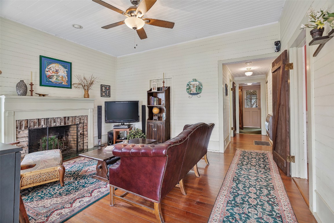 65094 Logan Road Yulee, FL 32097 - Photo 5 of 38 a living room with furniture and a fireplace