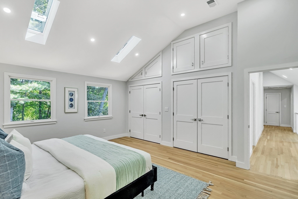 95 Country Club Road Dedham, MA 02026 - Photo 11 of 21 a bedroom with a bed and a window