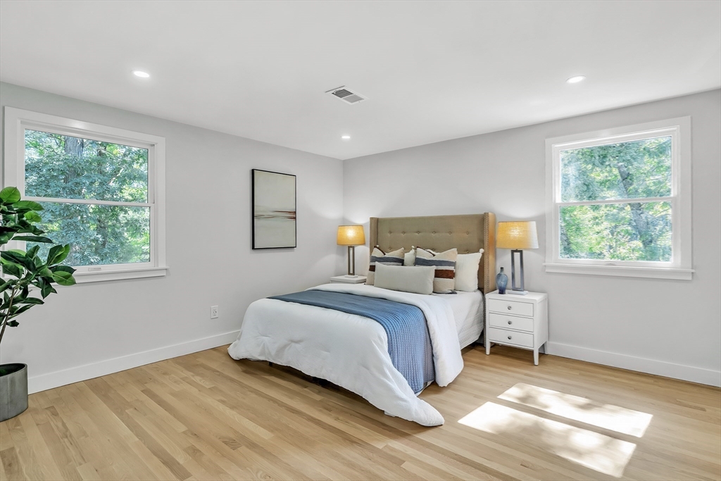 95 Country Club Road Dedham, MA 02026 - Photo 14 of 21 a bedroom with a bed and a window