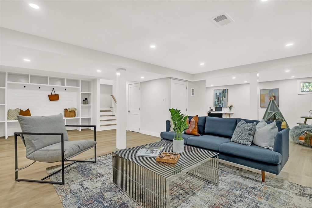 95 Country Club Road Dedham, MA 02026 - Photo 19 of 21 a living room with furniture and a table