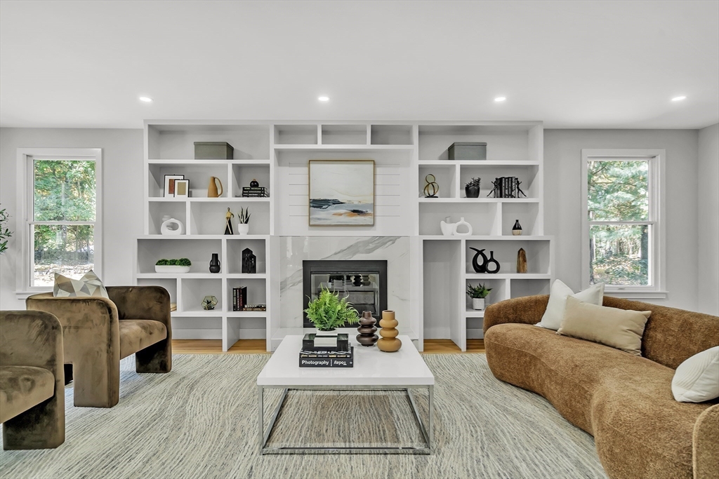 95 Country Club Road Dedham, MA 02026 - Photo 6 of 21 a living room with furniture and a fireplace