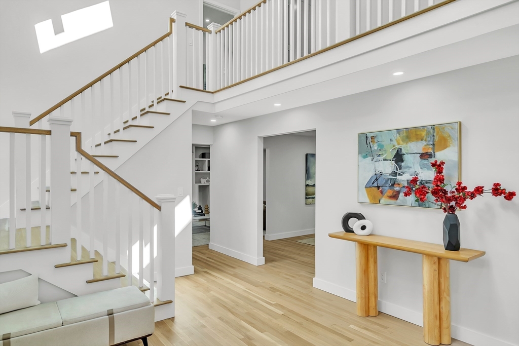 95 Country Club Road Dedham, MA 02026 - Photo 9 of 21 a view of entryway and hall with wooden floor