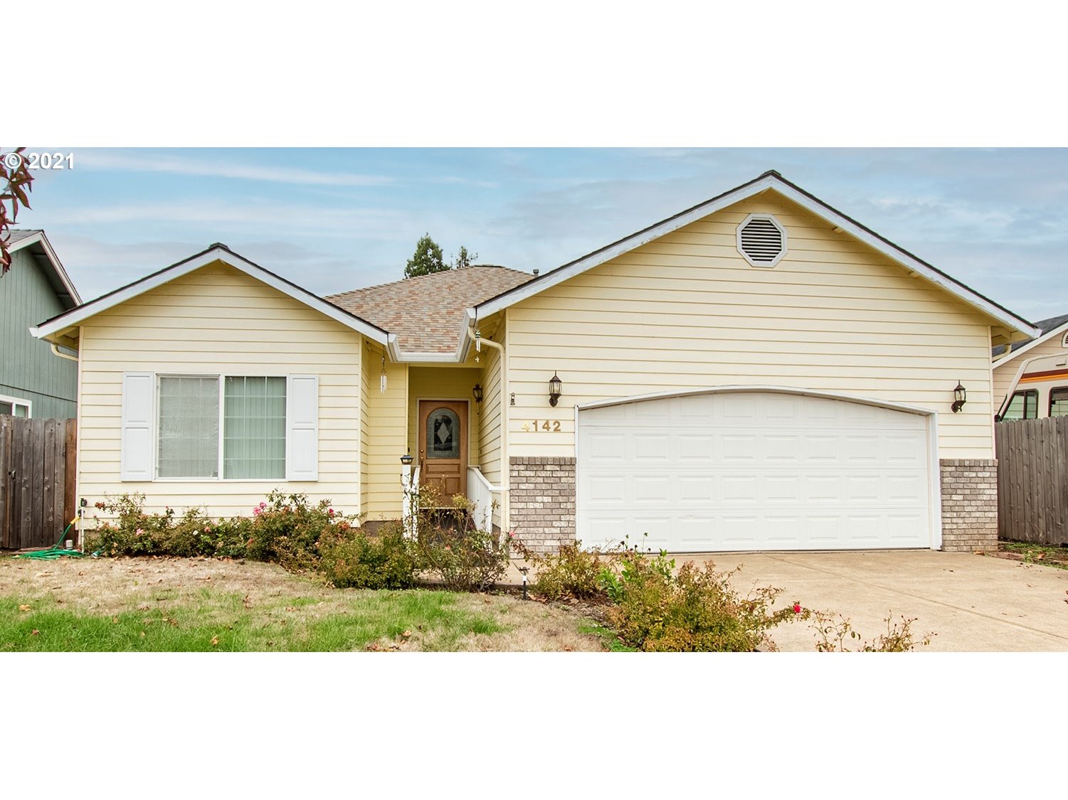 4142 South E Street Springfield, OR 97478 - Photo 1 of 26 a view of a house with a yard