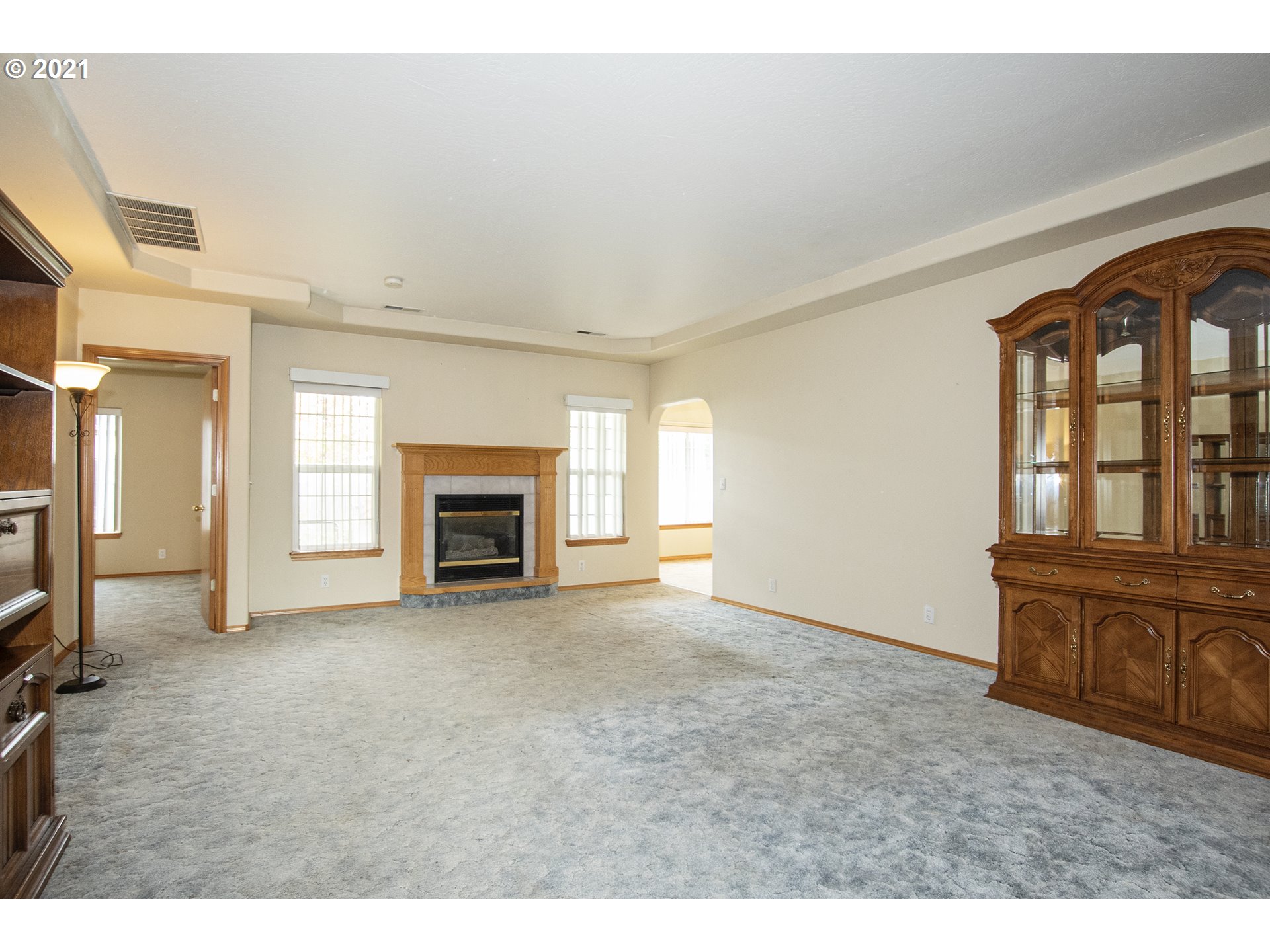 4142 South E Street Springfield, OR 97478 - Photo 4 of 26 a view of empty room with windows and fireplace