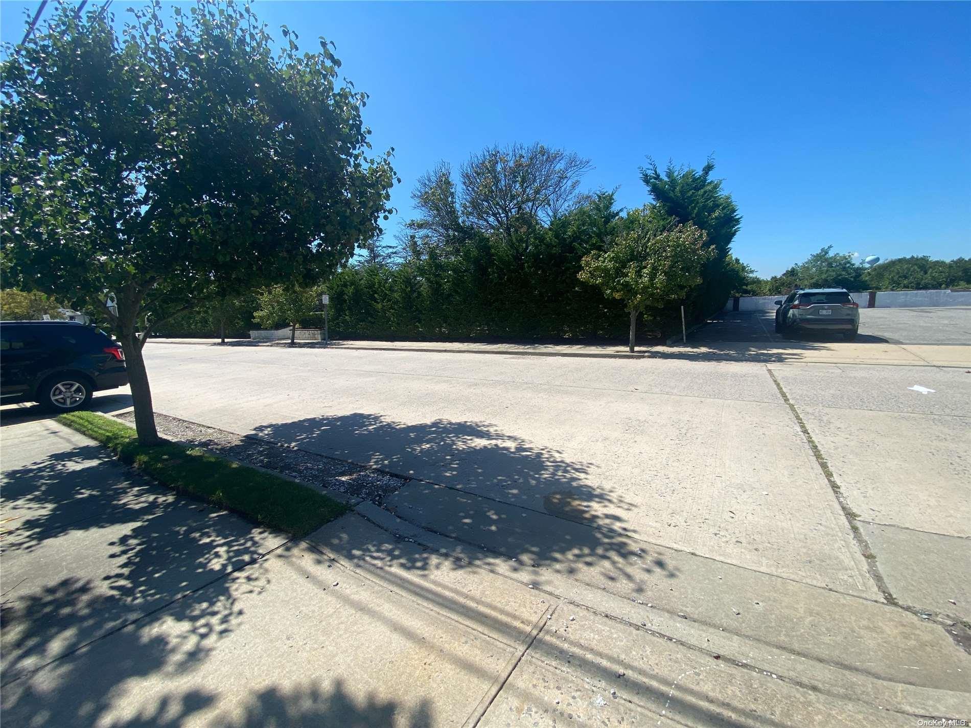 68 Parkside Drive Point Lookout, NY 11569 - Photo 12 of 17 a view of lot of ocean and tree