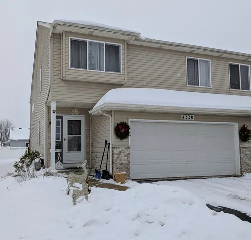 a view of backyard with wheel chair and potted plants