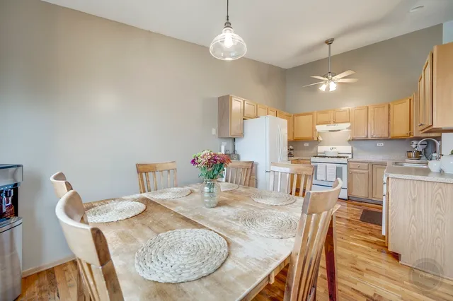 a view of a dining room with furniture