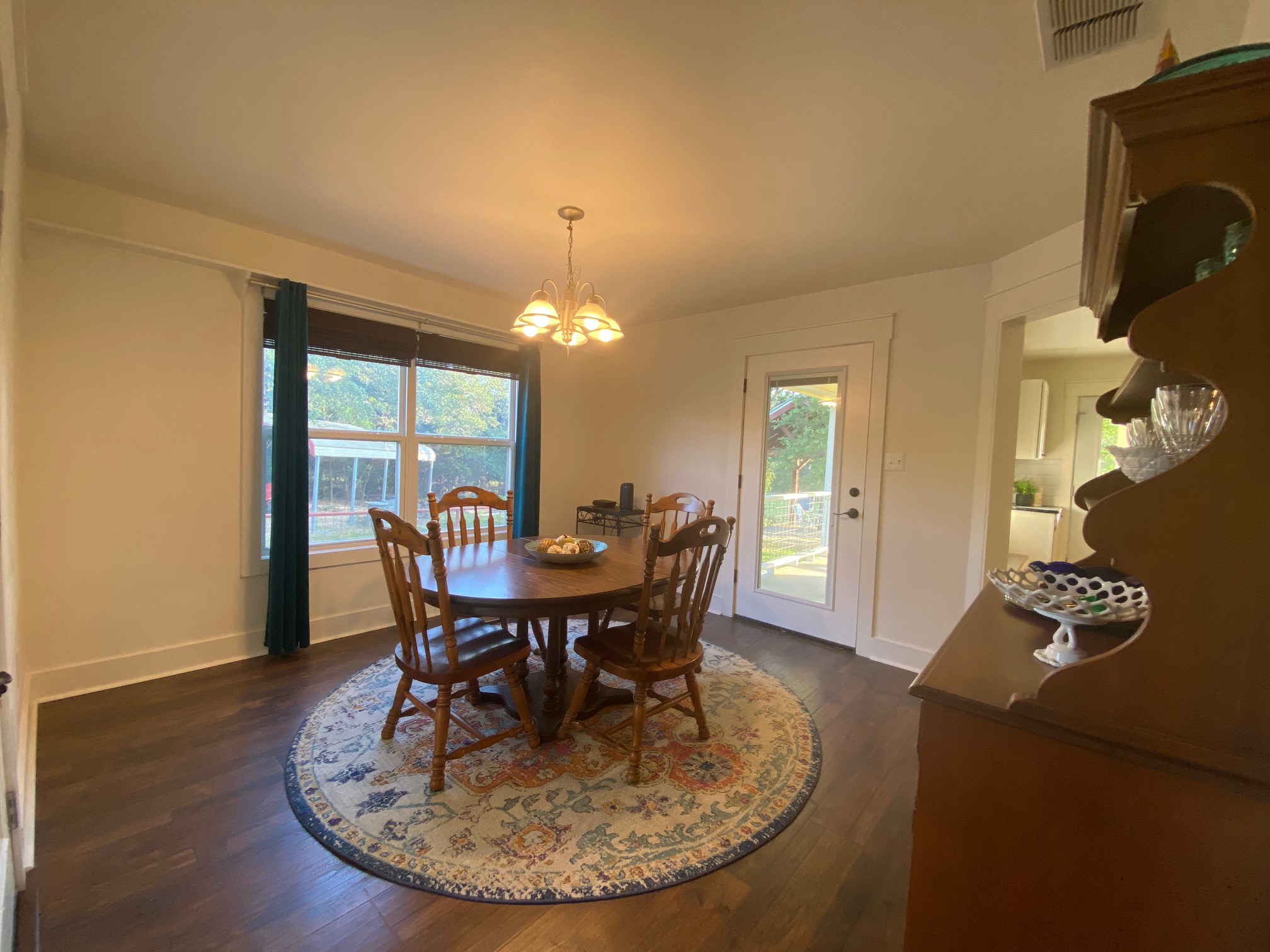 306 Plainview Road Wimberley, TX 78676 - Photo 6 of 29 A refined dining space perfect for entertaining. Exit doors to side porches.