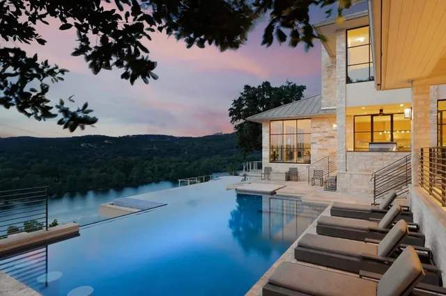 a view of a living room and a large window