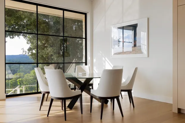 a living room with furniture and flat screen tv