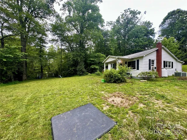 a house view with a garden space