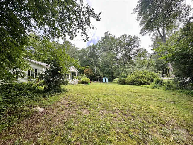a house view with a garden space