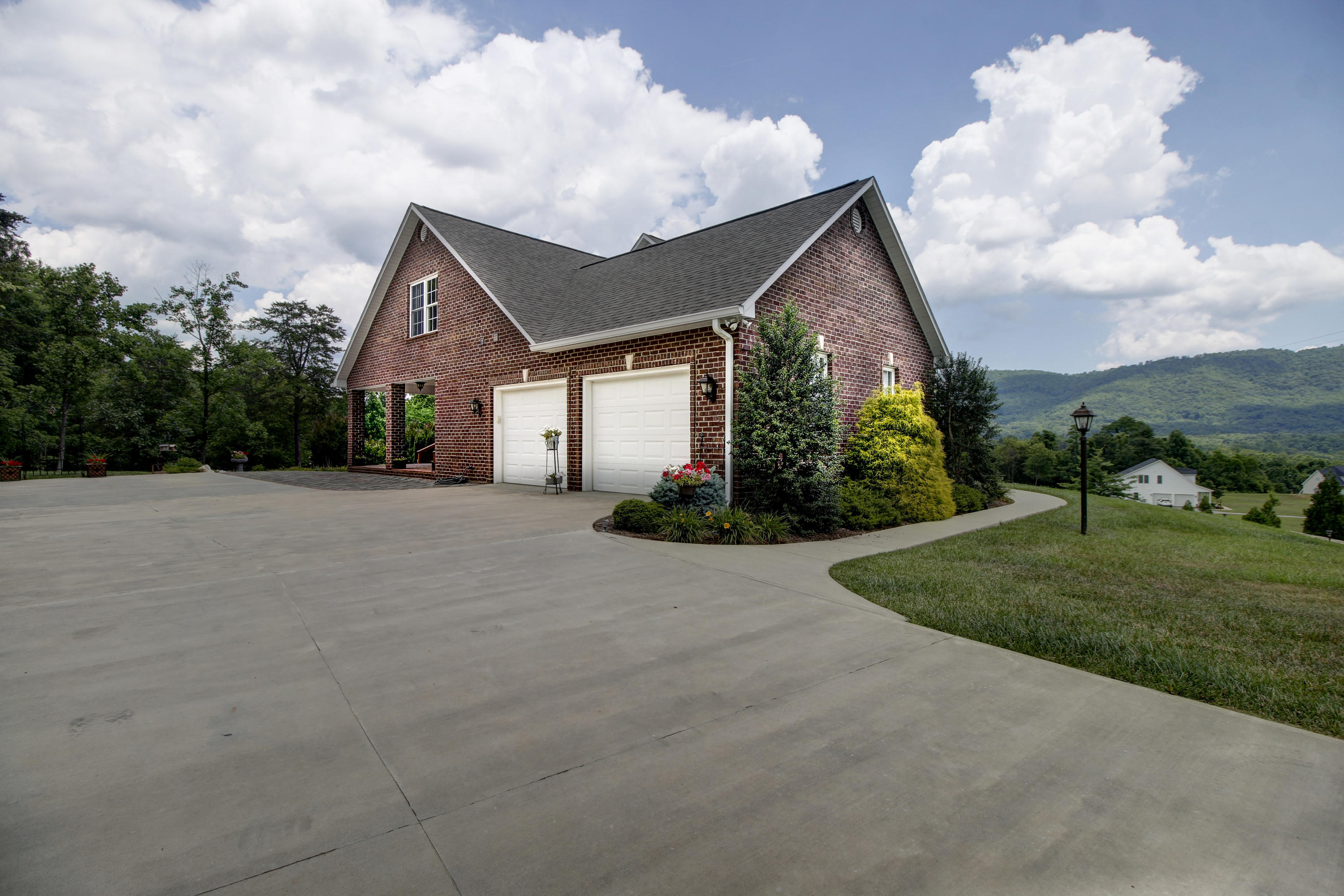 412 Thornblade Way Blue Ridge, VA 24064 - Photo 3 of 47 a front view of house with yard and green space