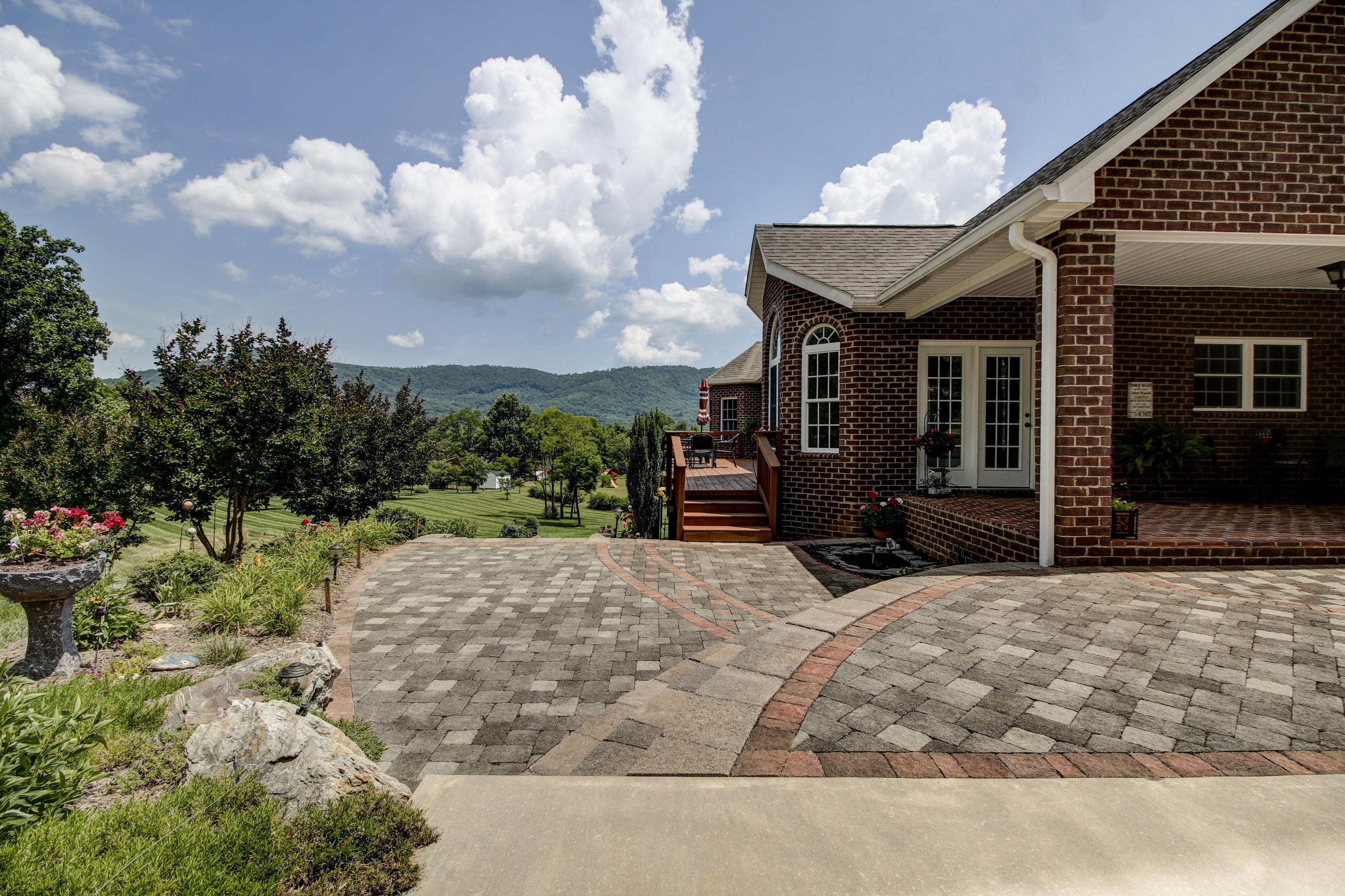 412 Thornblade Way Blue Ridge, VA 24064 - Photo 4 of 47 a view of a house with a patio