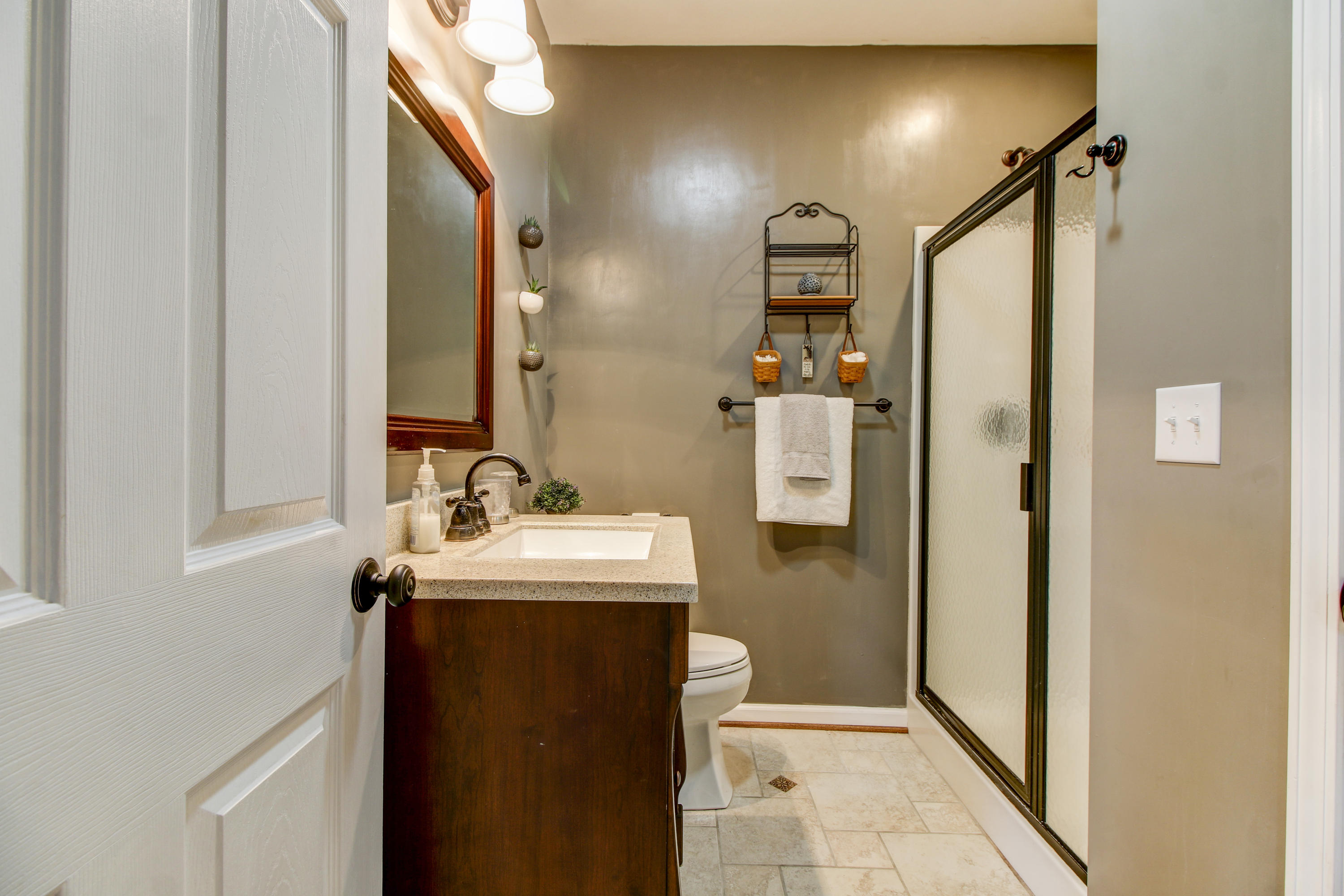 412 Thornblade Way Blue Ridge, VA 24064 - Photo 31 of 47 a bathroom with a sink toilet and shower