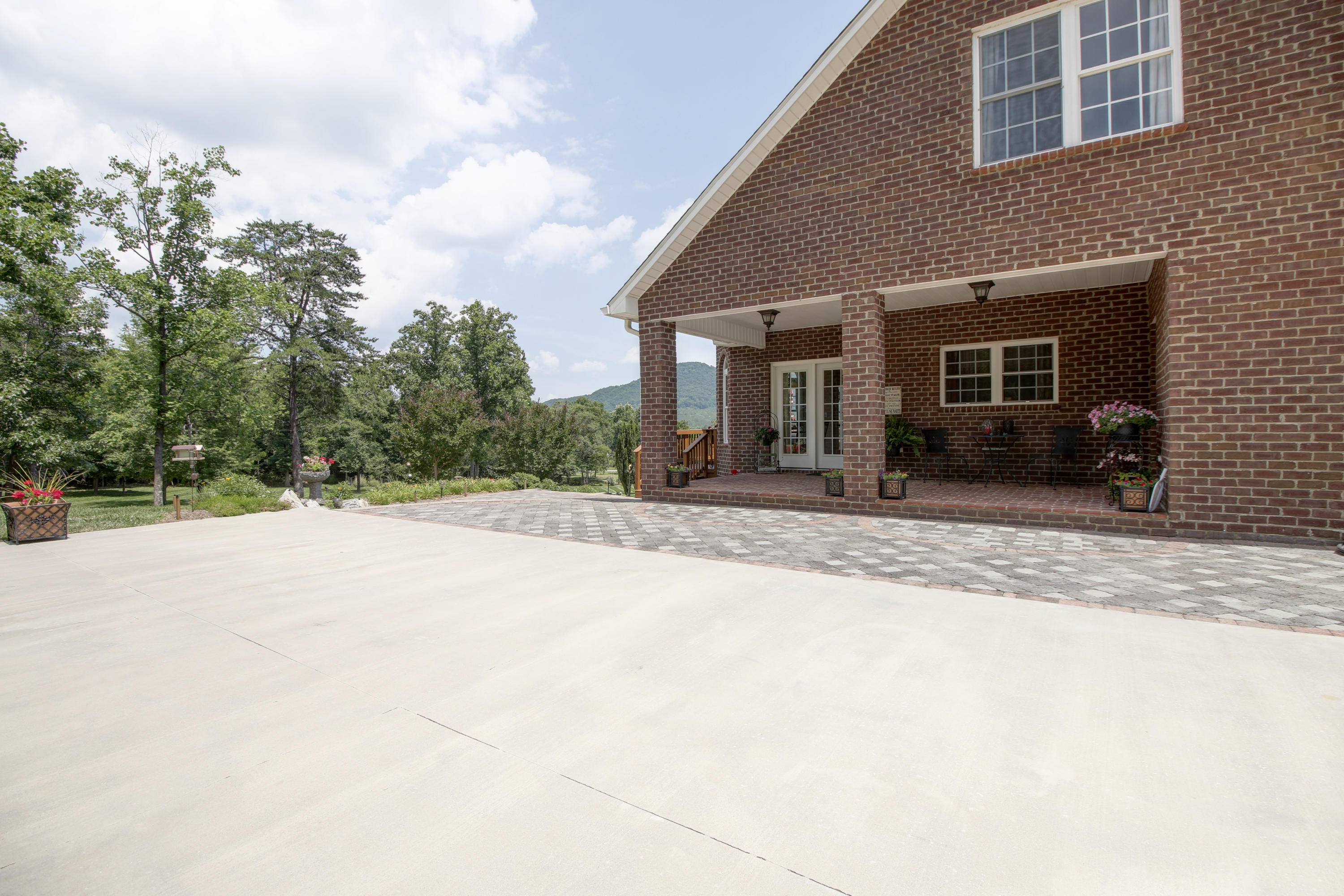 412 Thornblade Way Blue Ridge, VA 24064 - Photo 33 of 47 a front view of a house with a yard and garage