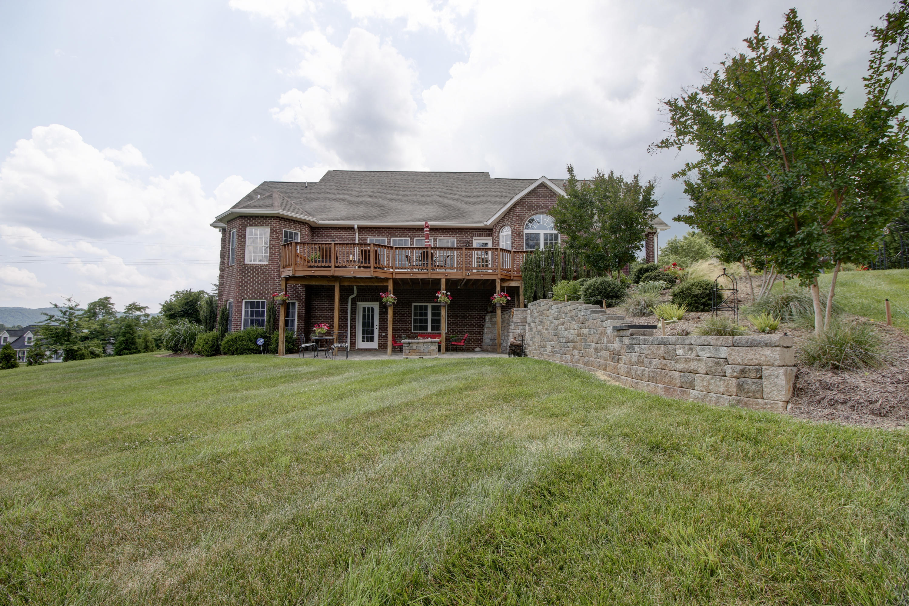 412 Thornblade Way Blue Ridge, VA 24064 - Photo 35 of 47 a front view of a house with a garden