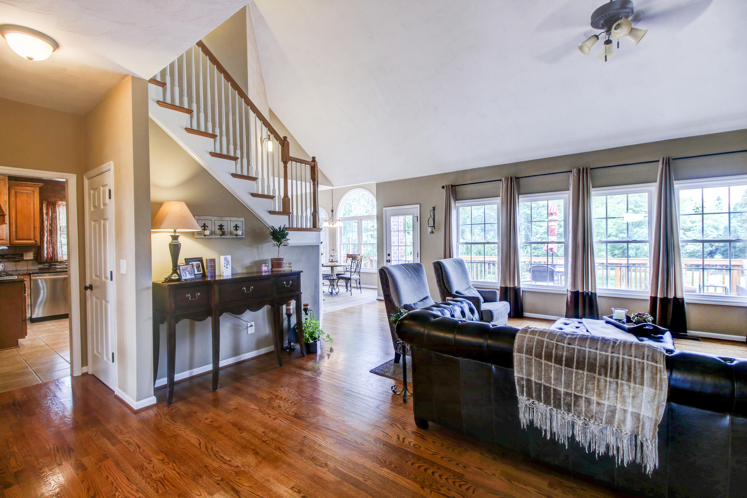 412 Thornblade Way Blue Ridge, VA 24064 - Photo 9 of 47 a living room with furniture and a wooden floor