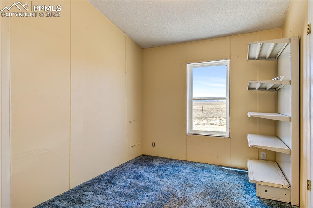36210 Heavenly View Yoder, CO 80864 - Photo 20 of 42 a view of an empty room and window