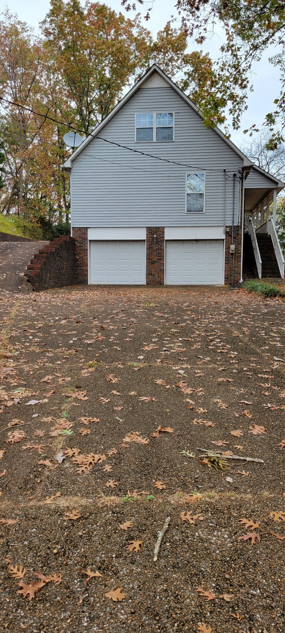 6995 Old Riv Rd Pike Nashville, TN 37209 - Photo 2 of 9 a front view of house with yard