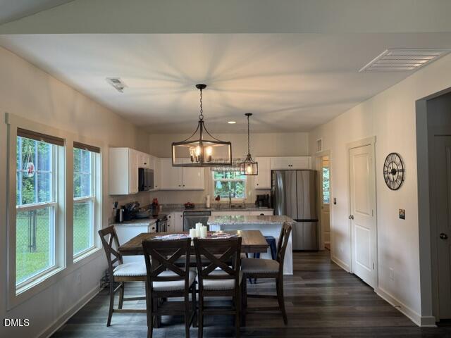 574 East Ridge Avenue Liberty, NC 27298 - Photo 7 of 28 a view of a dining room with furniture window and outside view
