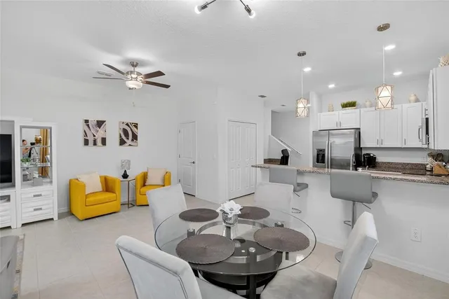 a bathroom with a shower curtain and a toilet