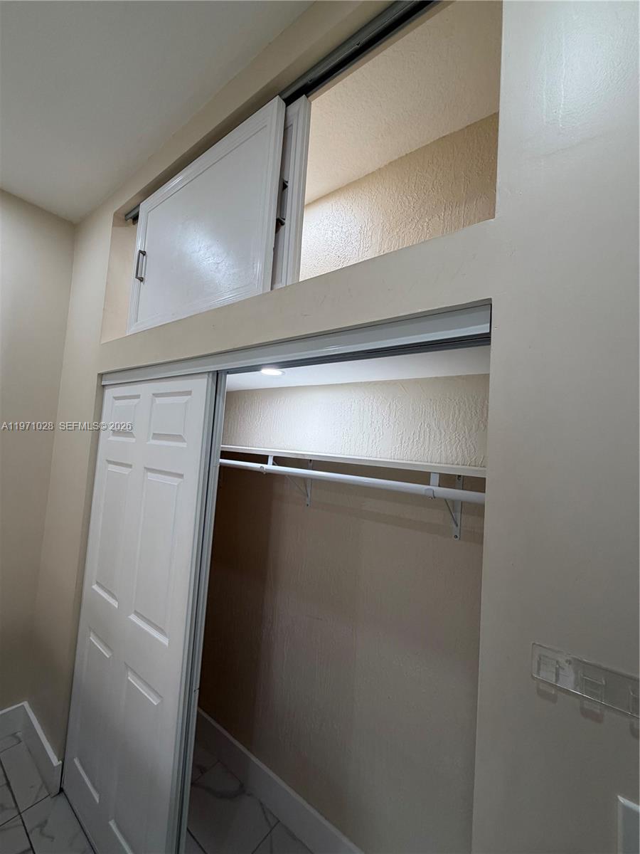 18255 Southwest 145th Avenue, Unit BACK Miami, FL 33177 - Photo 11 of 15 a view of closet